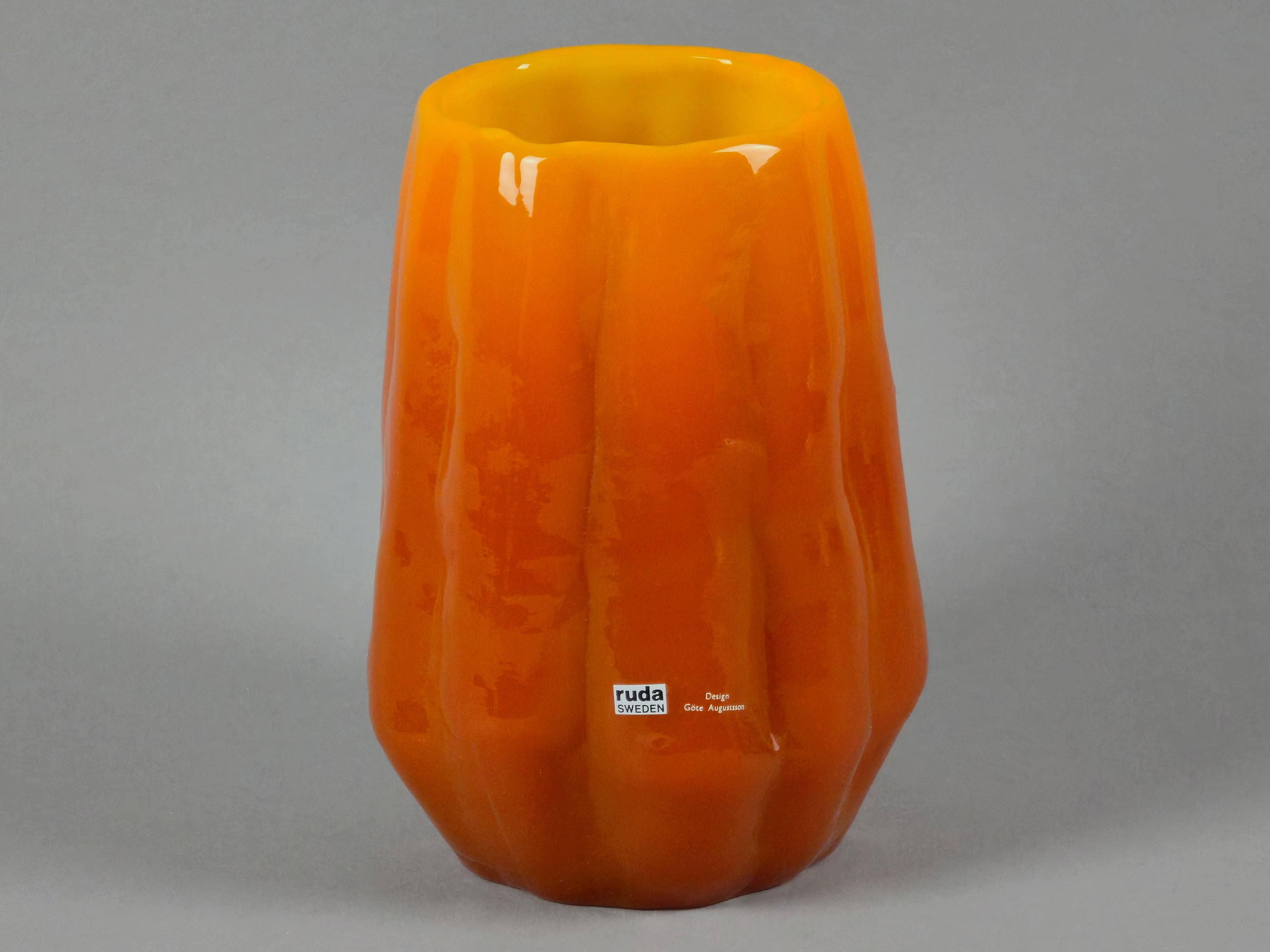 1960s vintage Ruda Glasbruk Selena vase by Gote Augustsson in orange and yellow hue, photo showing the depth, texture and the surface of the vase.