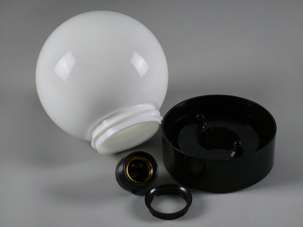 Dismantled shot of the 1960s vintage MCM globe glass light fixture by Corodex Holland, showing the underside of the fittings, base and glass globe.