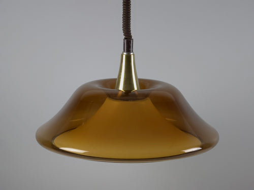 Unlit view of the Space Age hanging lamp, showcasing the rich, translucent amber color of the acrylic dome.