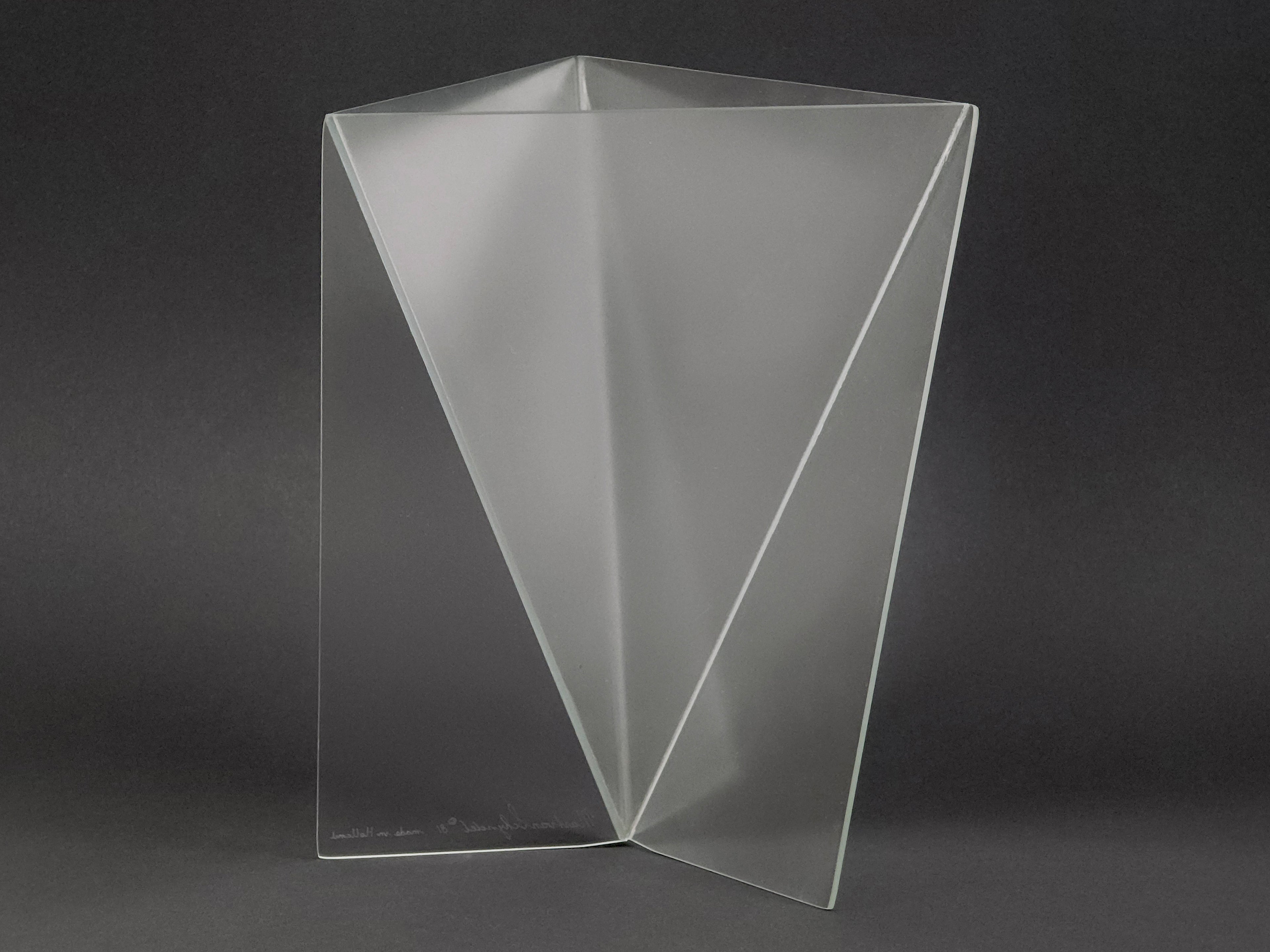 1981 Mart van Schijndel Delta vase, Dutch postmodern design iconic frosted glass vase, photo showing a second image of the depth of the vase and the connection of the angular glass forms together.