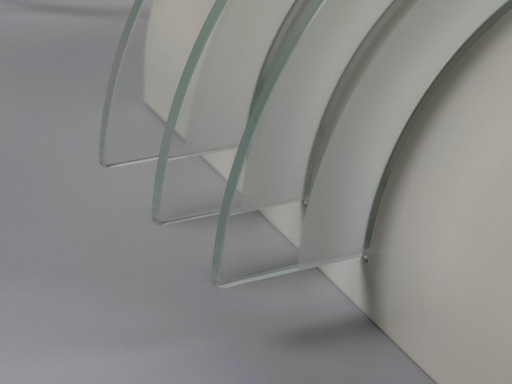 Close-up of the thick stepped glass discs of the IKEA Drittel lamp, highlighting the vintage postmodern material quality.