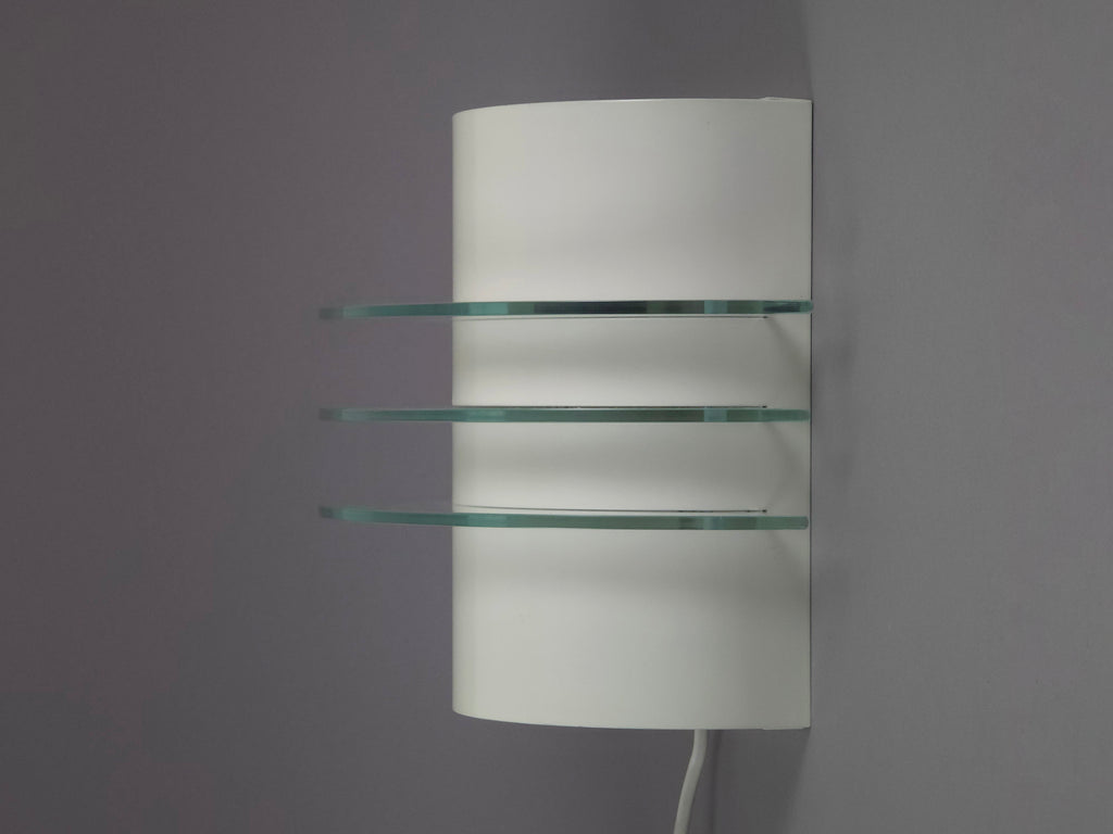 Profile of IKEA Drittel lamp highlighting the minimalist 1990s architectural silhouette and glass plate arrangement.