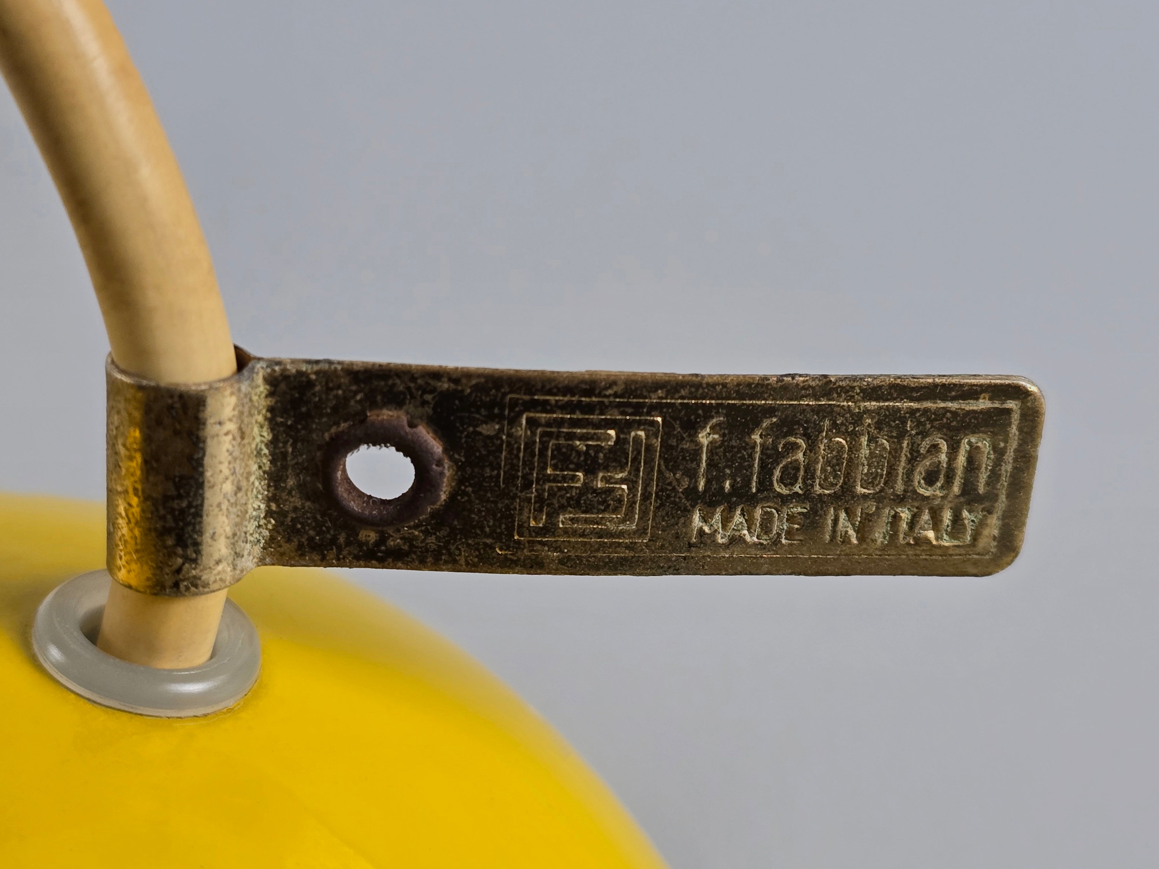 1980s Vintage Fabbian Italian opaline glass pendant lamp, Mid-Century Modern conical white opal hand-blown glass with yellow design details, showing the authentic branding tag.