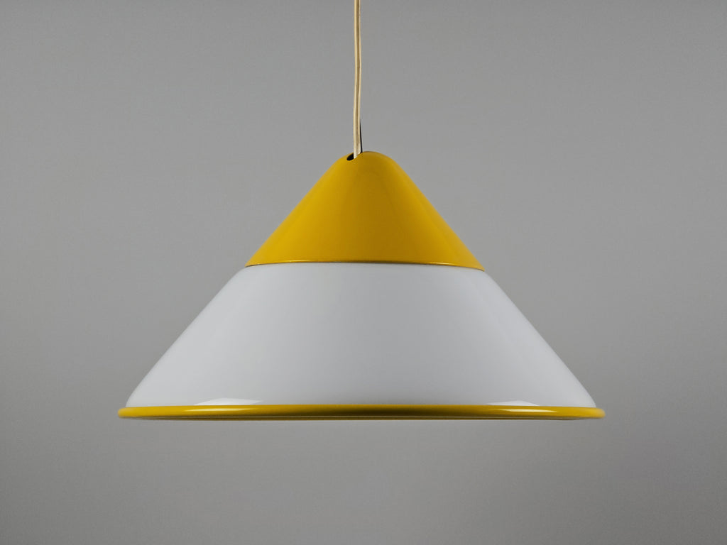 1980s Vintage Fabbian Italian opaline glass pendant lamp, Mid-Century Modern conical white opal hand-blown glass with yellow design details, profile view.