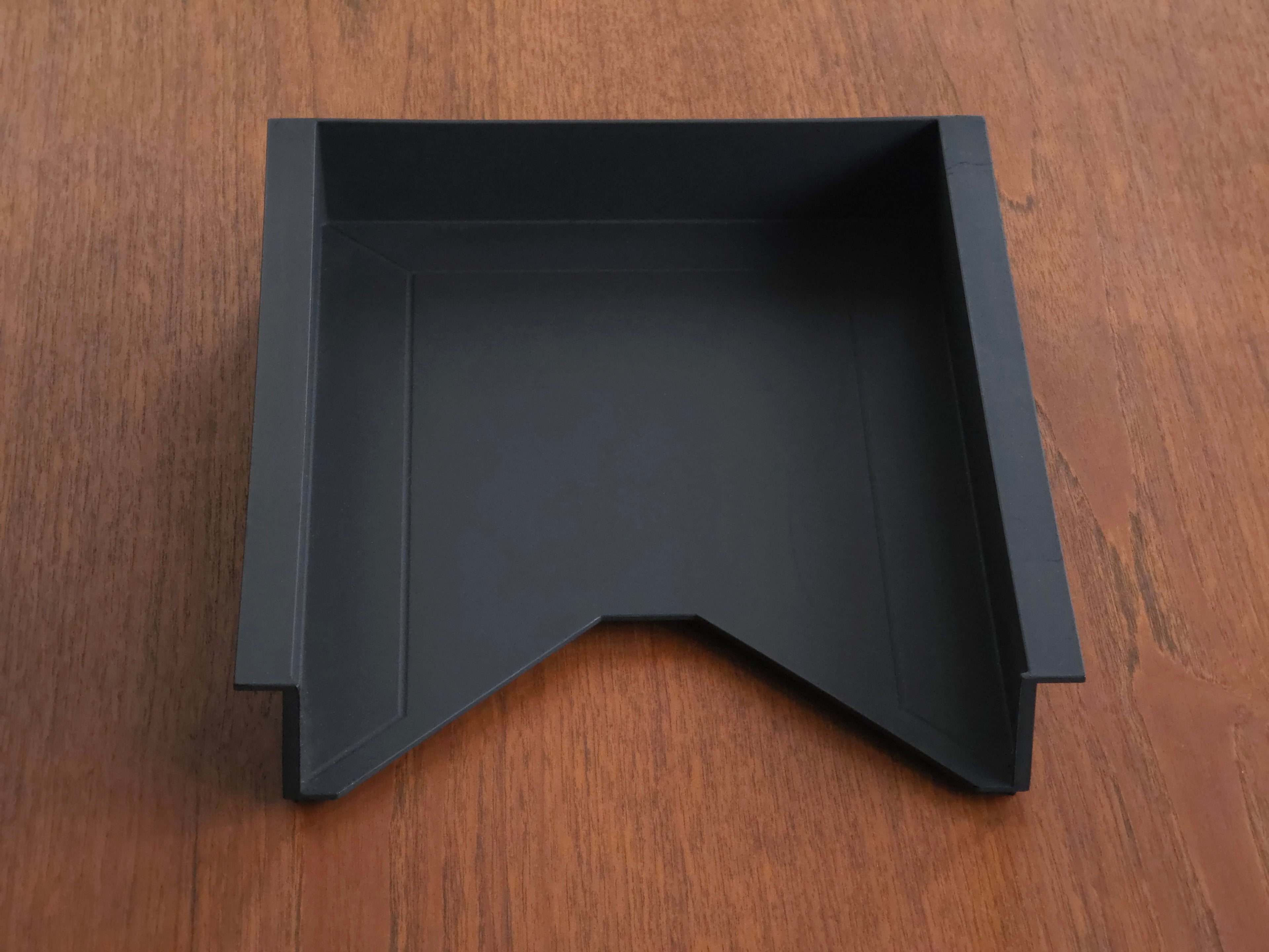 Vintage Helit document tray designed by Norman Foster, matte black soft-touch finish, here the image shows a front bird eye view shot of the tray and the V-shaped design detail.