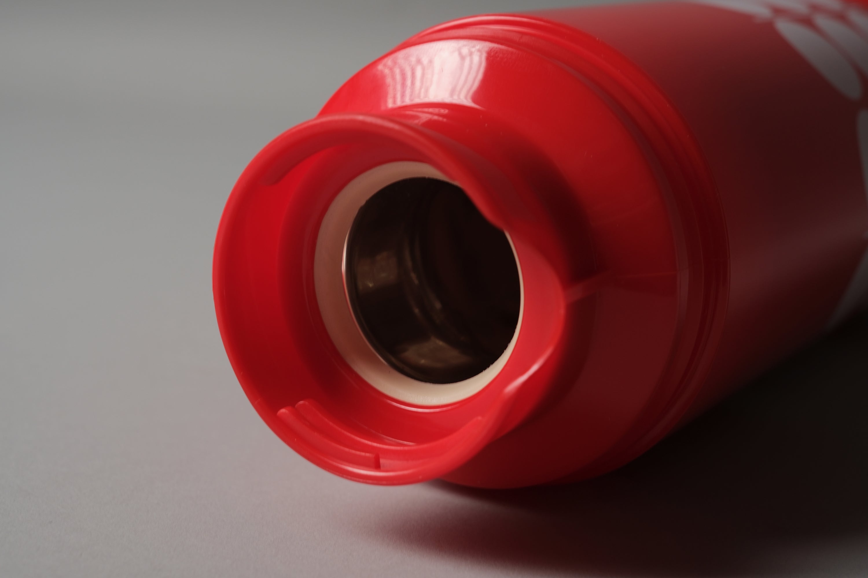 Rotpunkt Dr Zimmermann vacuum flask, interior glass vacuum vessel visible, red ABS body, 1970s