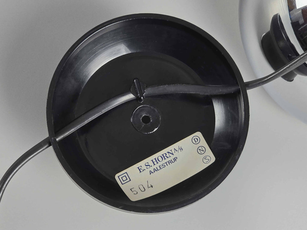 A close-up detail of the authentic label which reads "E.S. HORN/S AALESTRUP" and "504". A black wire is attached to the component.