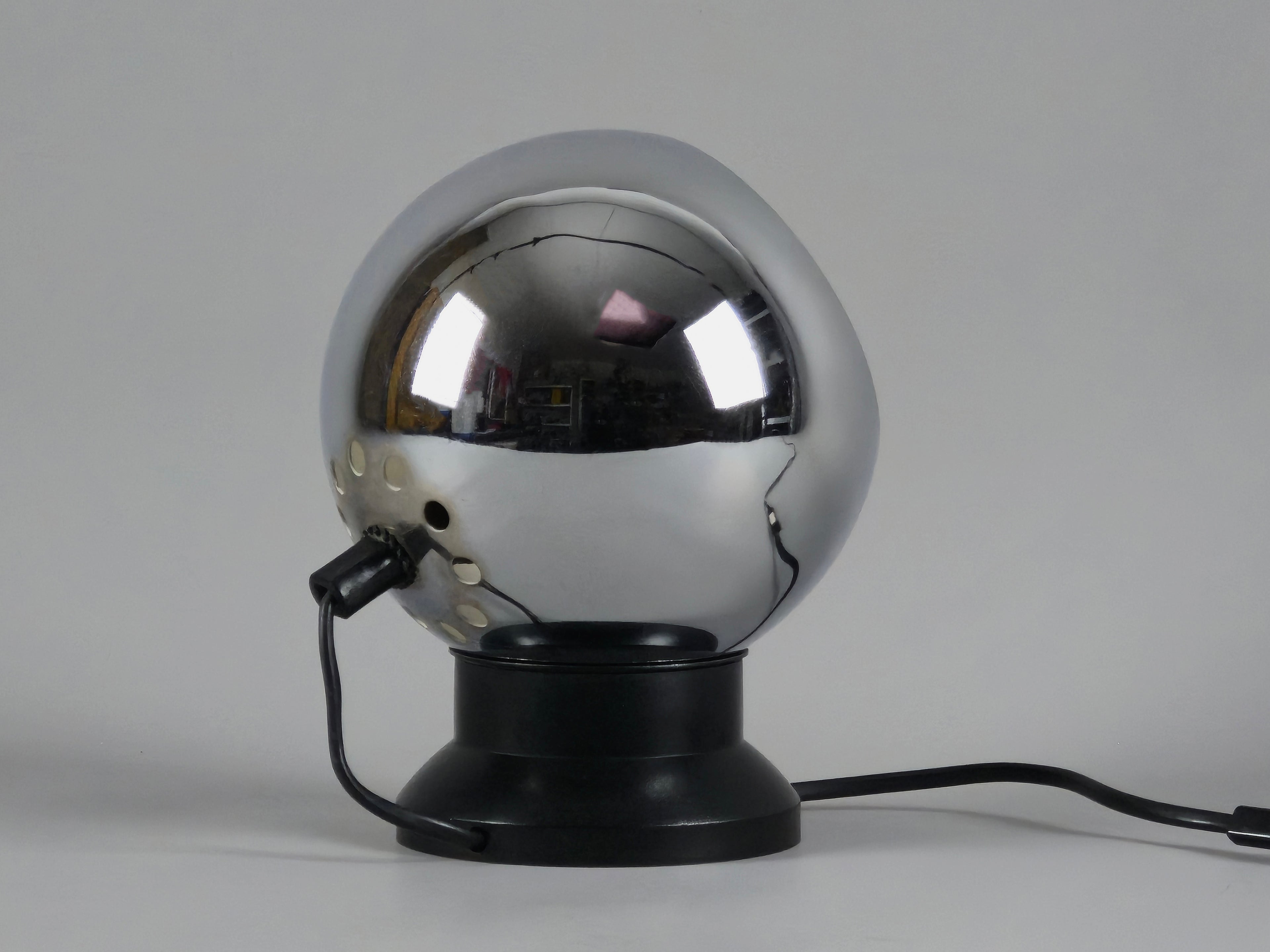 Rear view of vintage E.S. Horn magnetic ball table lamp in chrome and black.
