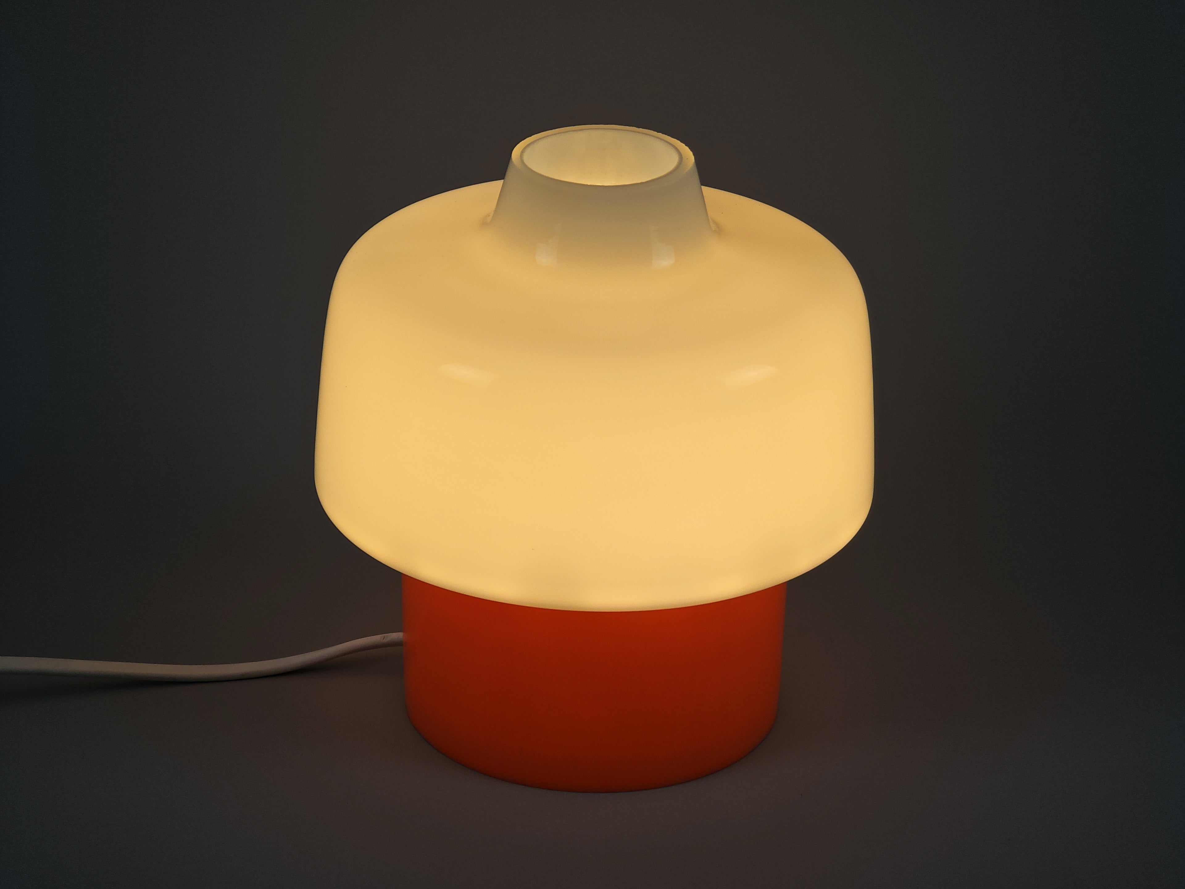 retro 1970s bedside table lamp showing the amber glow