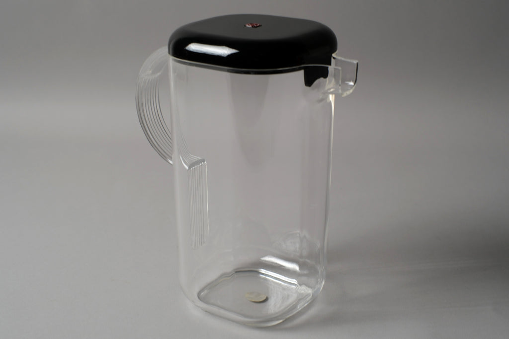Guzzini Amanda pitcher by Ambrogio Pozzi, clear acrylic body with black lid, Italy 1970s, new old stock
