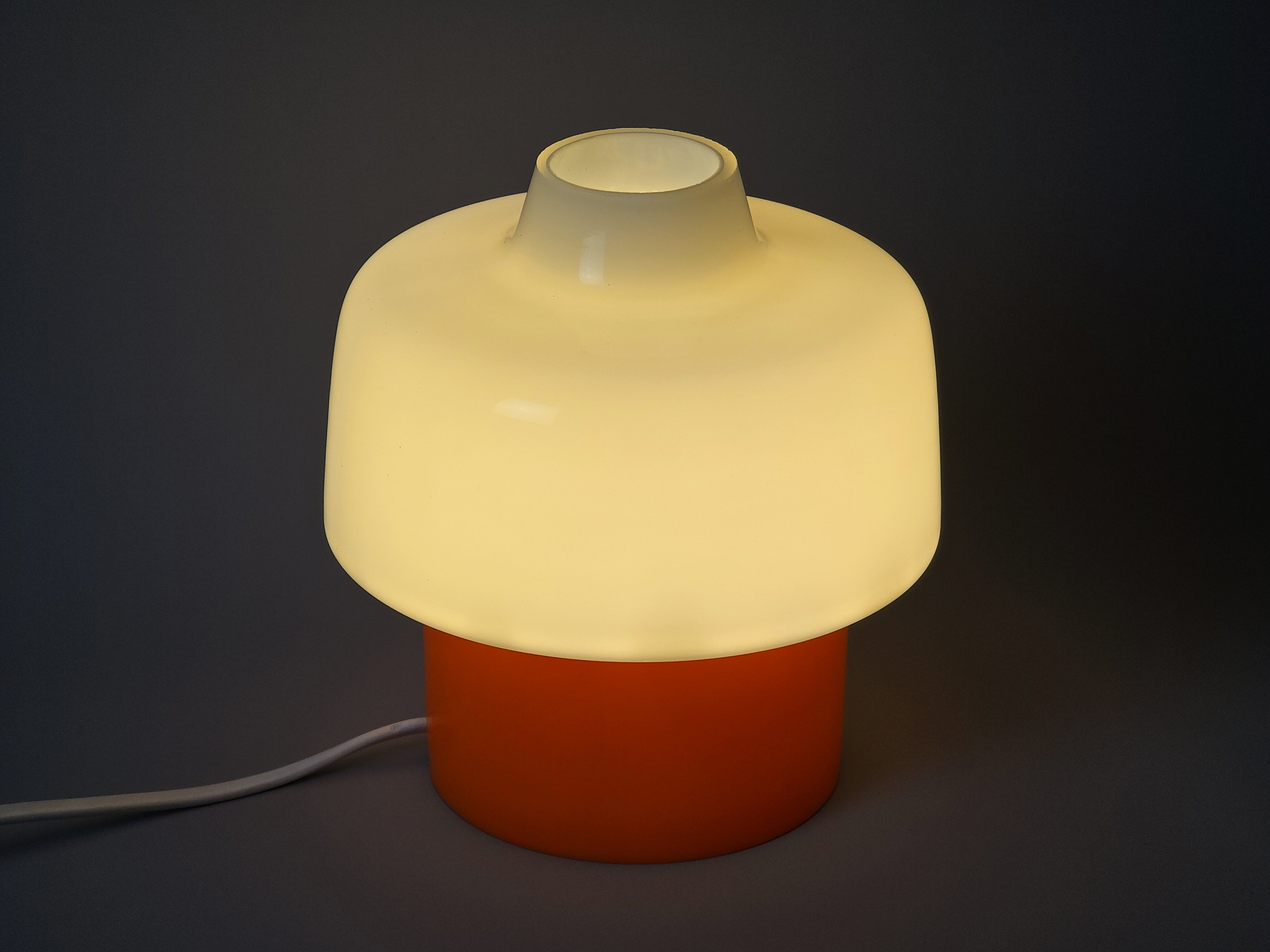 image showing the vintage lamp lit in the dark