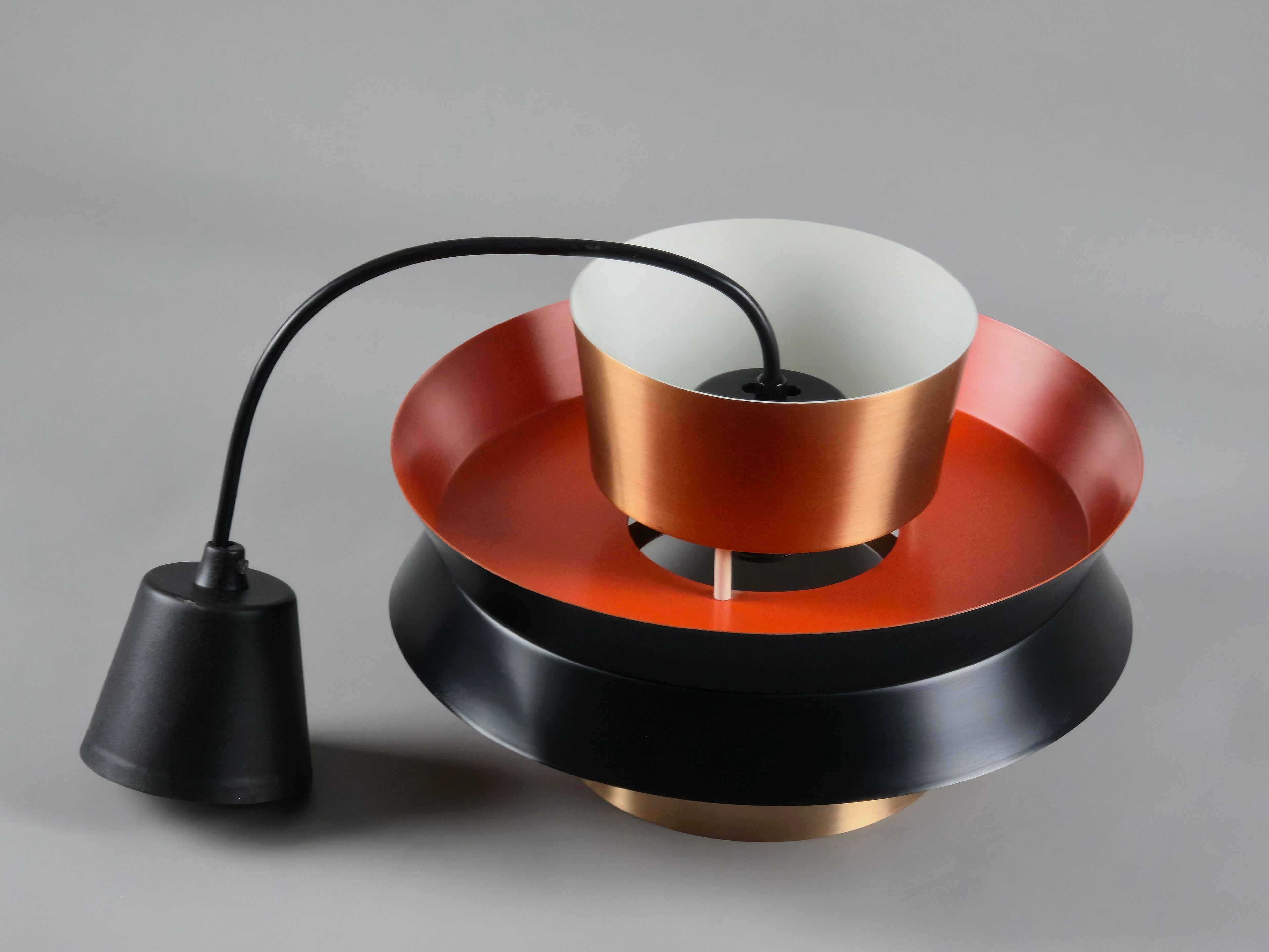 photo showing the full trava lamp from the top with the plastic ceiling canopy