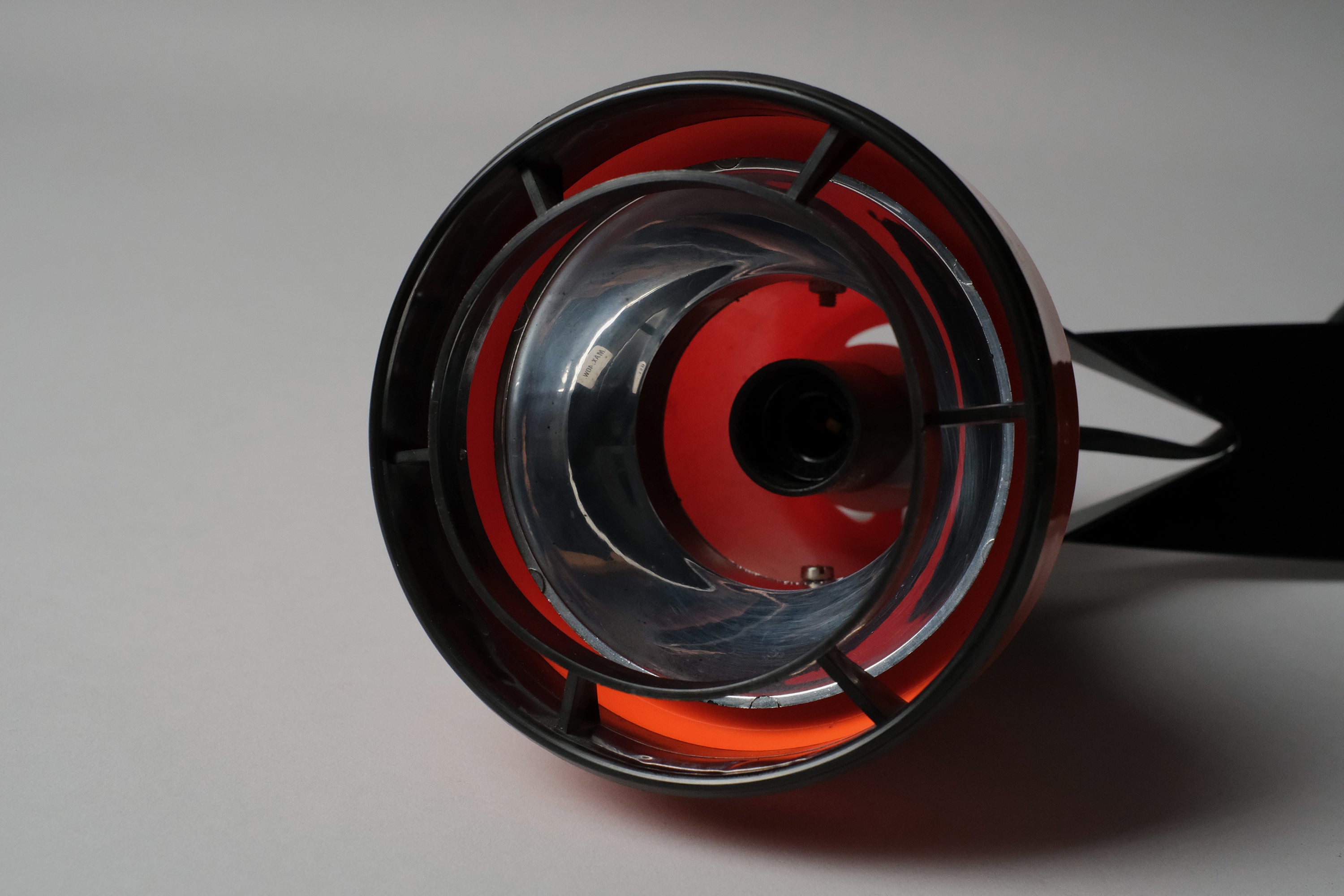 Close-up macro of the E14 bulb fitting inside the orange plastic shade of the Lyskaer Belysning Type 632