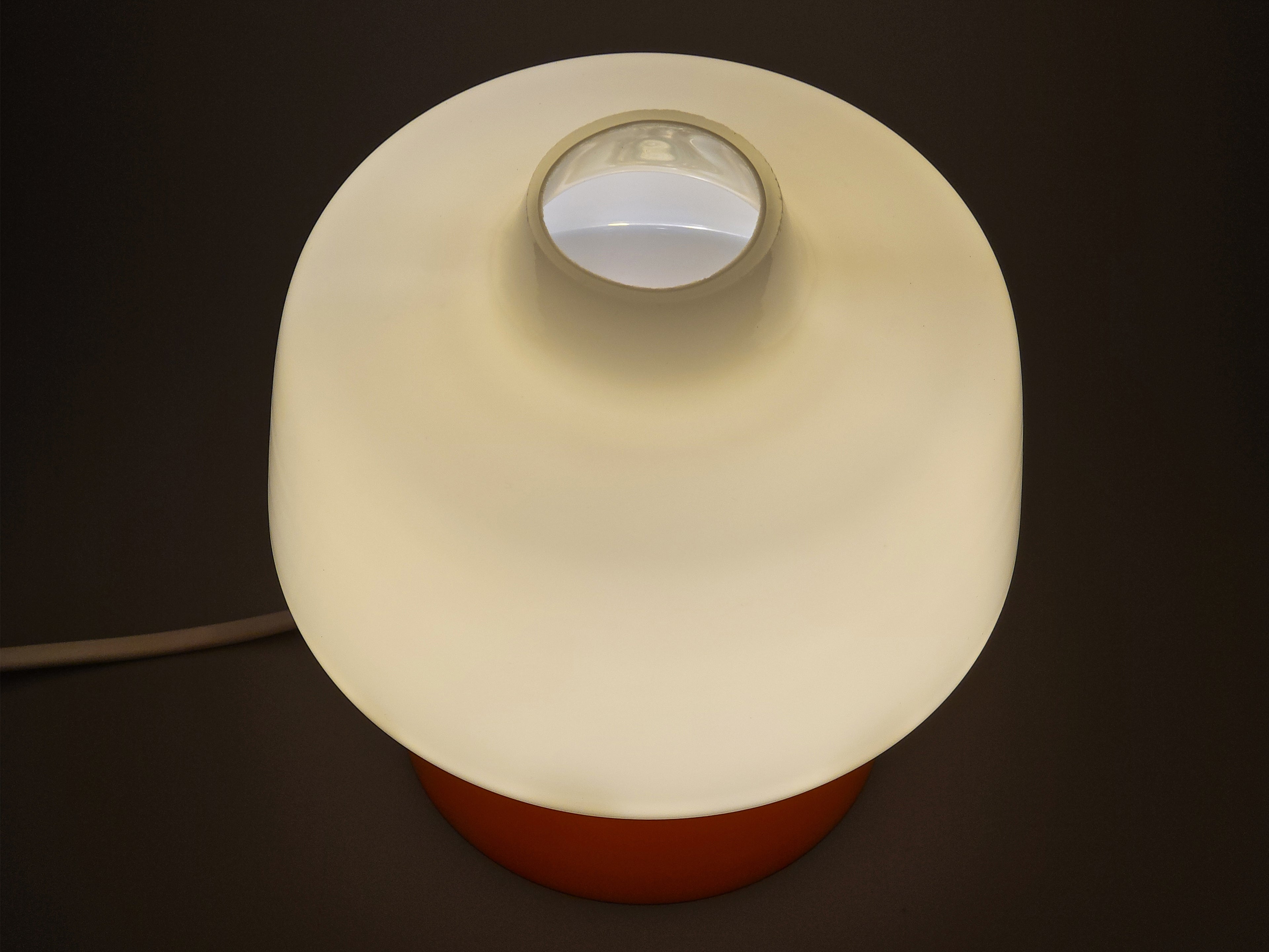 close up showing the opal glass glow of 70s lamp