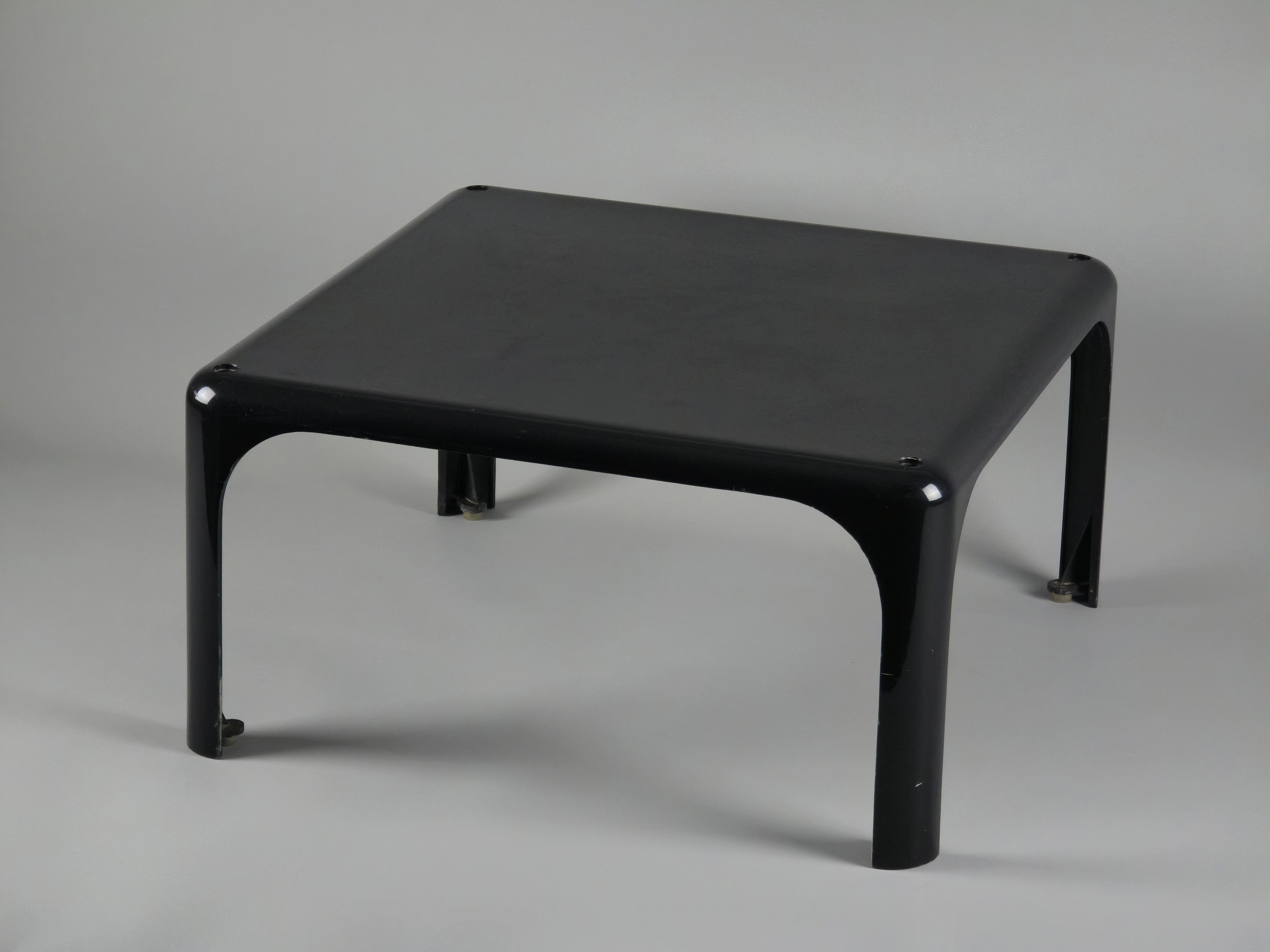 1960s MCM Artemide Milano 'Demetrio 45' black fiberglass side table by Vico Magistretti, the photo shown is another angular view of the table from the right side.
