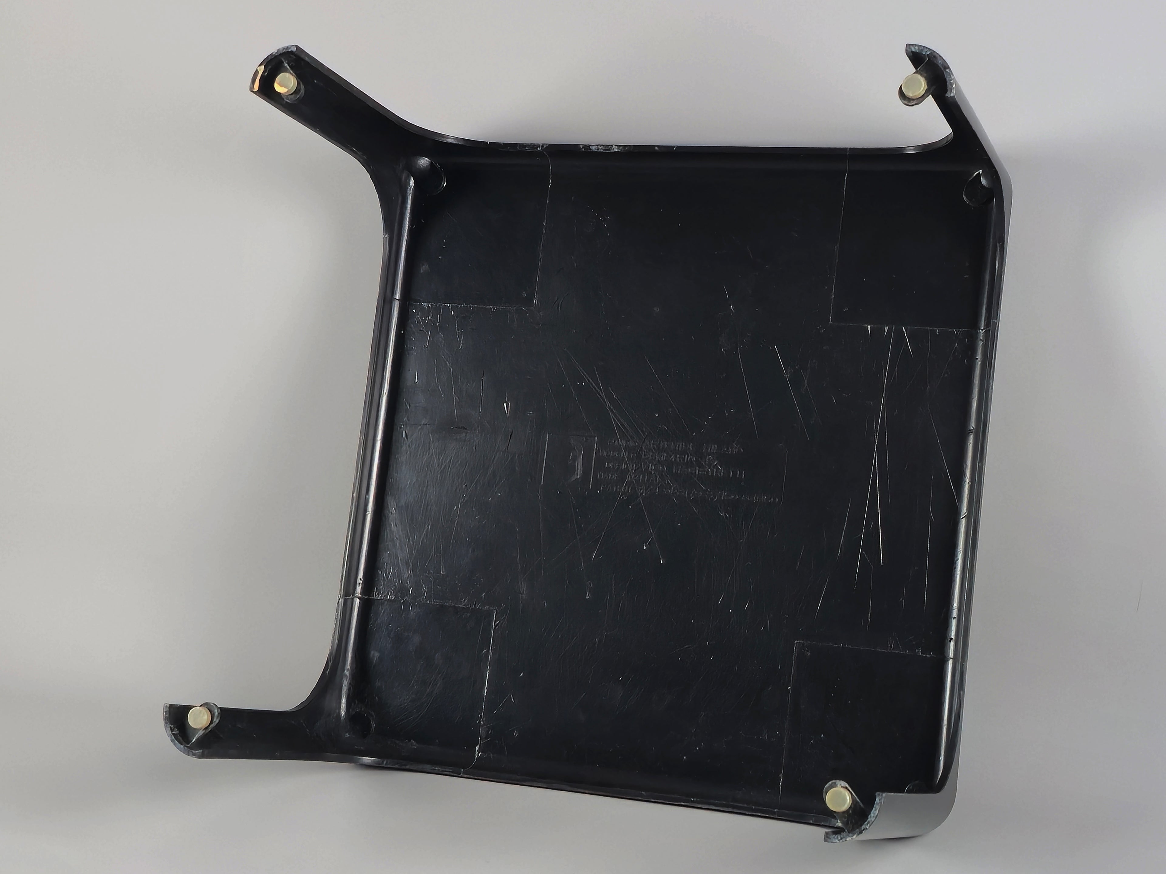 1960s MCM Artemide Milano 'Demetrio 45' black fiberglass side table by Vico Magistretti, bottom shot of the table.