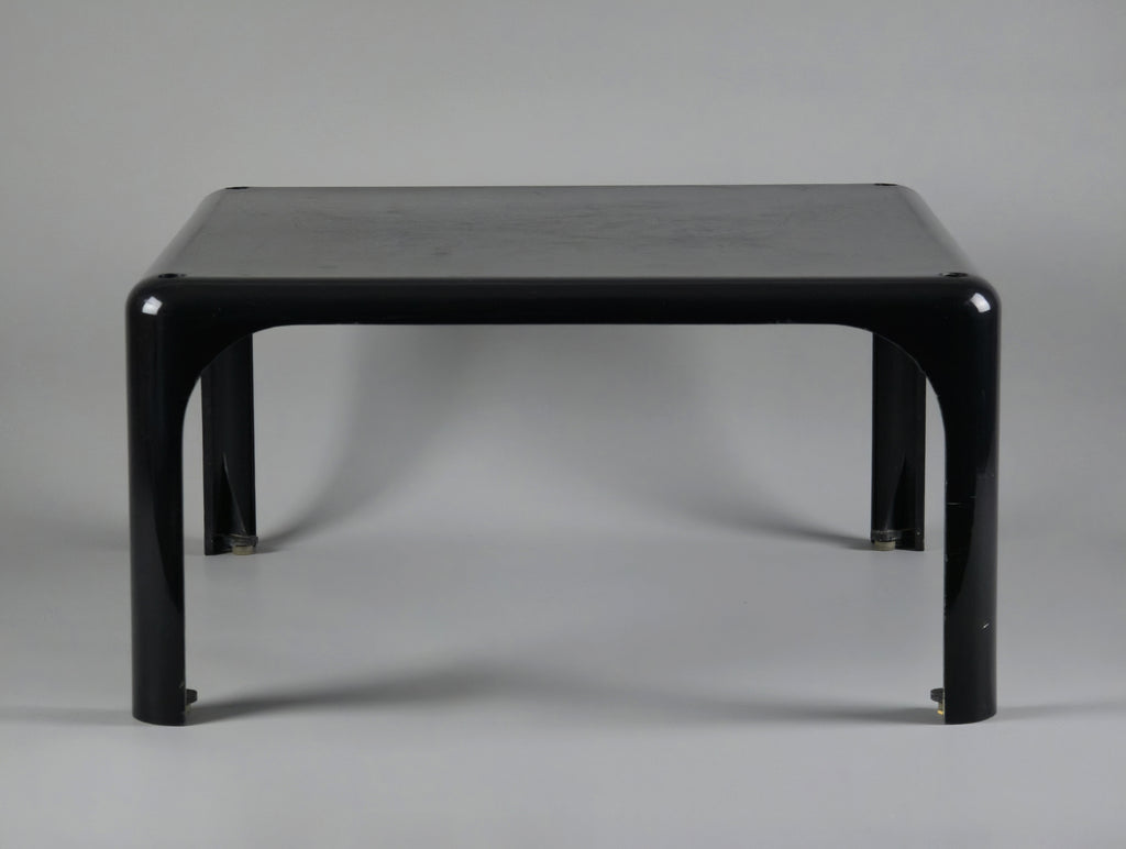 1960s MCM Artemide Milano 'Demetrio 45' black fiberglass side table by Vico Magistretti, front view slightly from the top end to show the depth feel of the table.