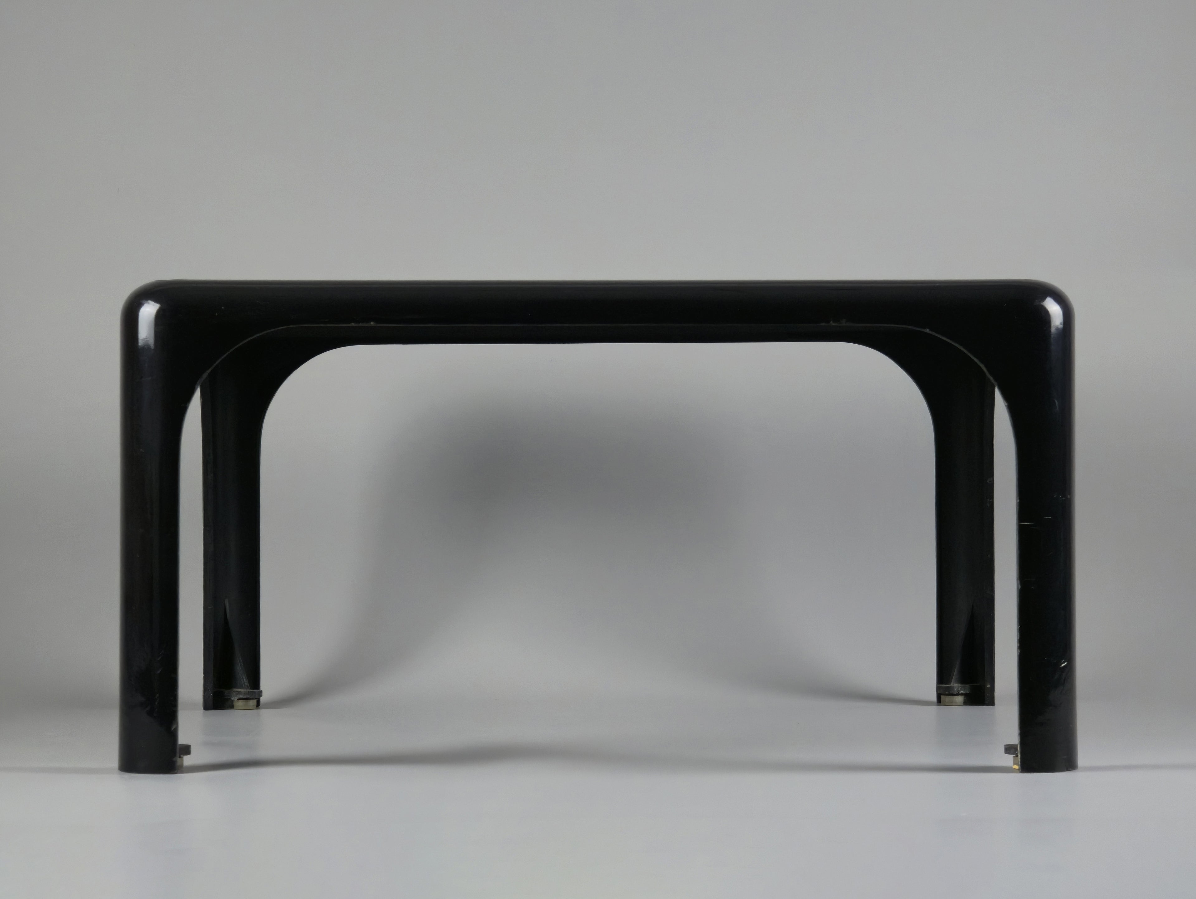 1960s MCM Artemide Milano 'Demetrio 45' black fiberglass side table by Vico Magistretti, front view.