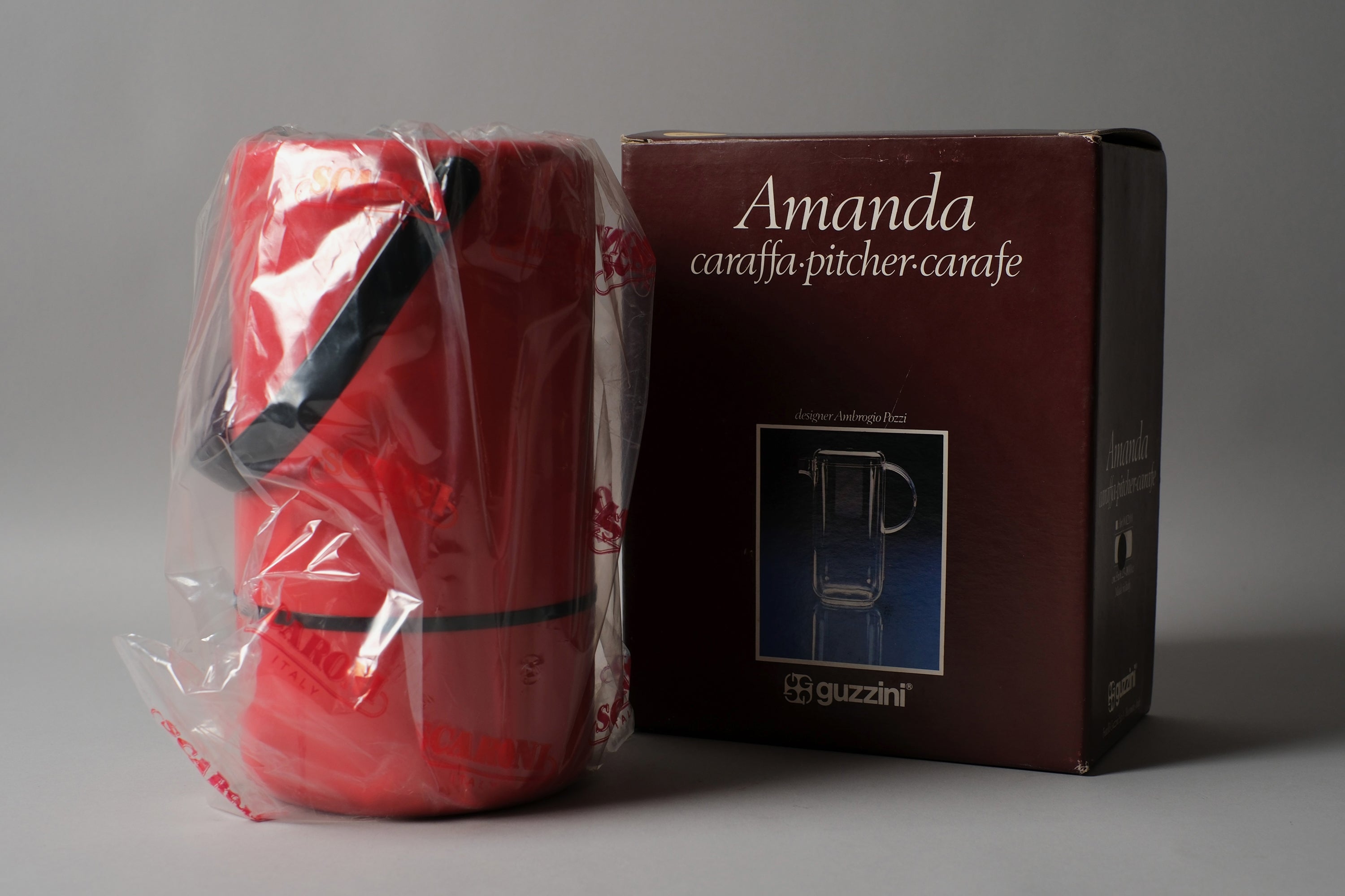 Guzzini Amanda pitcher and Scaroni wine cooler in original boxes with nylon wrap, Italy 1970s