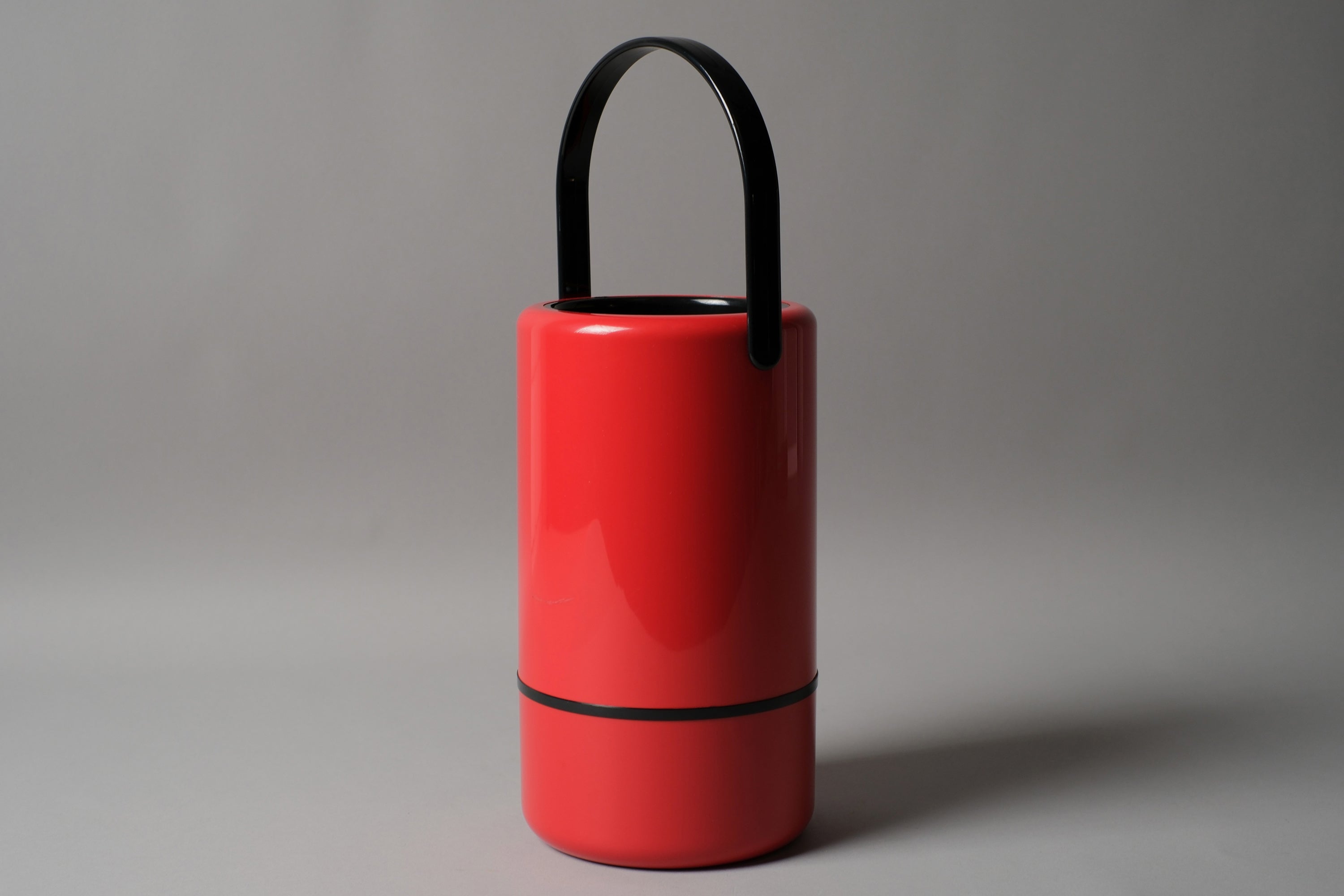 Scaroni thermo wine cooler, full height visible, red ABS with black handle, Italian Space Age 1970s