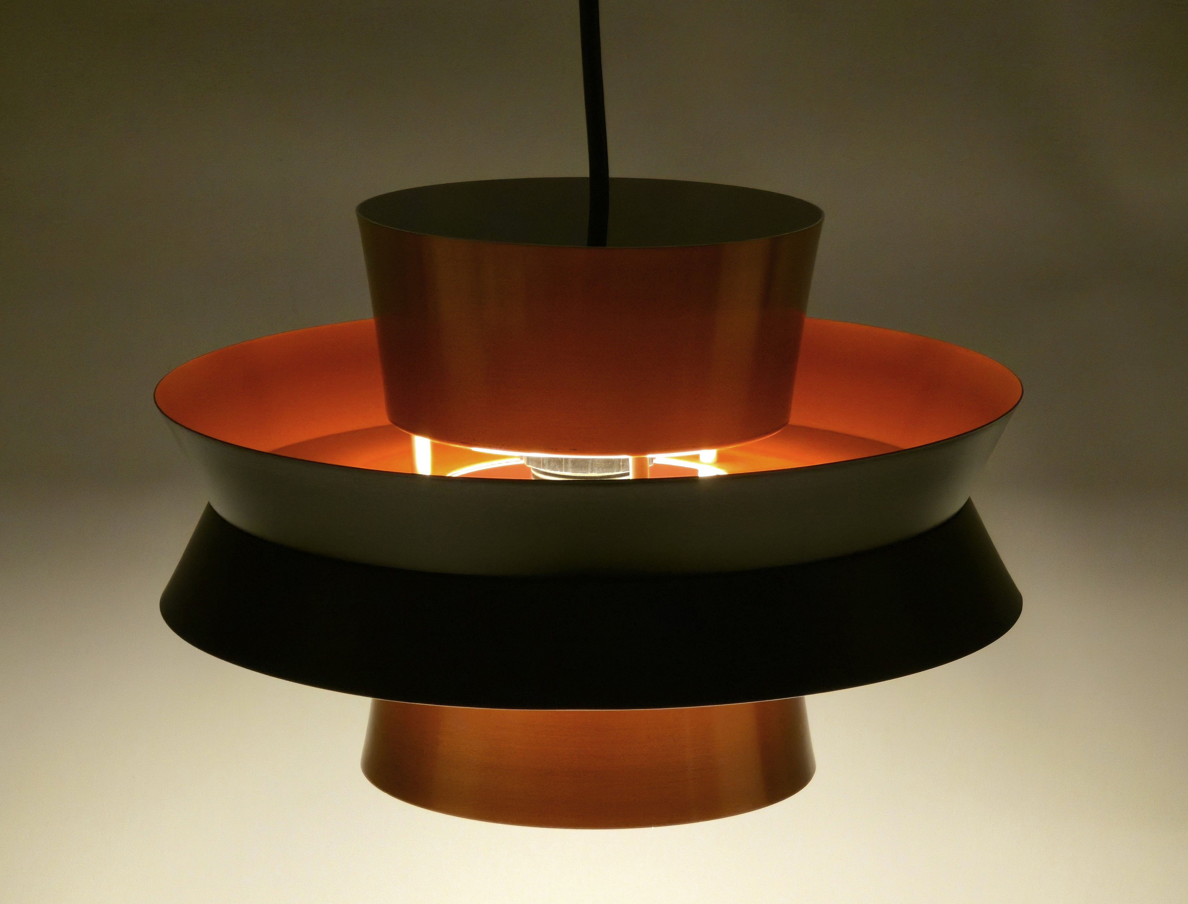 image showing the trava pendant lamp lit in the dark