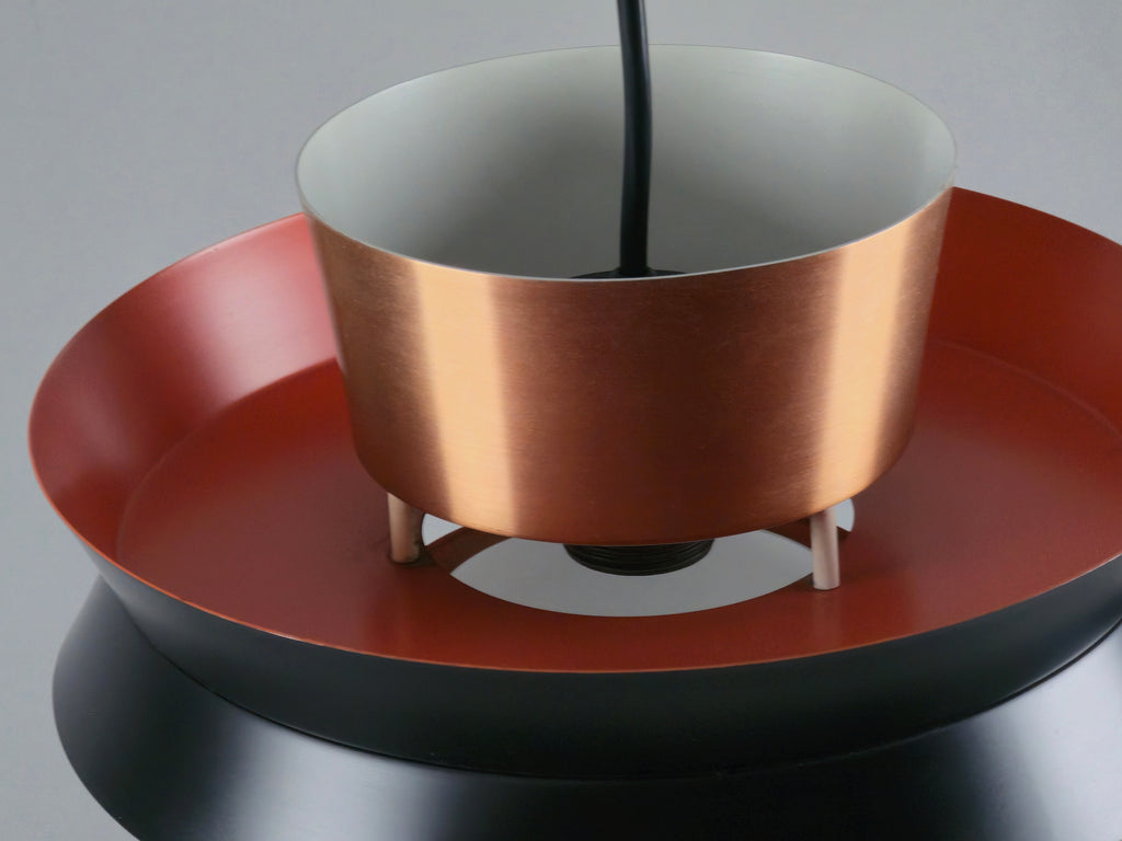 close up image showing the copper texture and orange of the vintage granhaga lamp