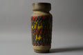 VEB Haldensleben fat lava vase, 24cm, zigzag relief in orange and yellow with charcoal ridges on sandy matte body, East Germany 1960s