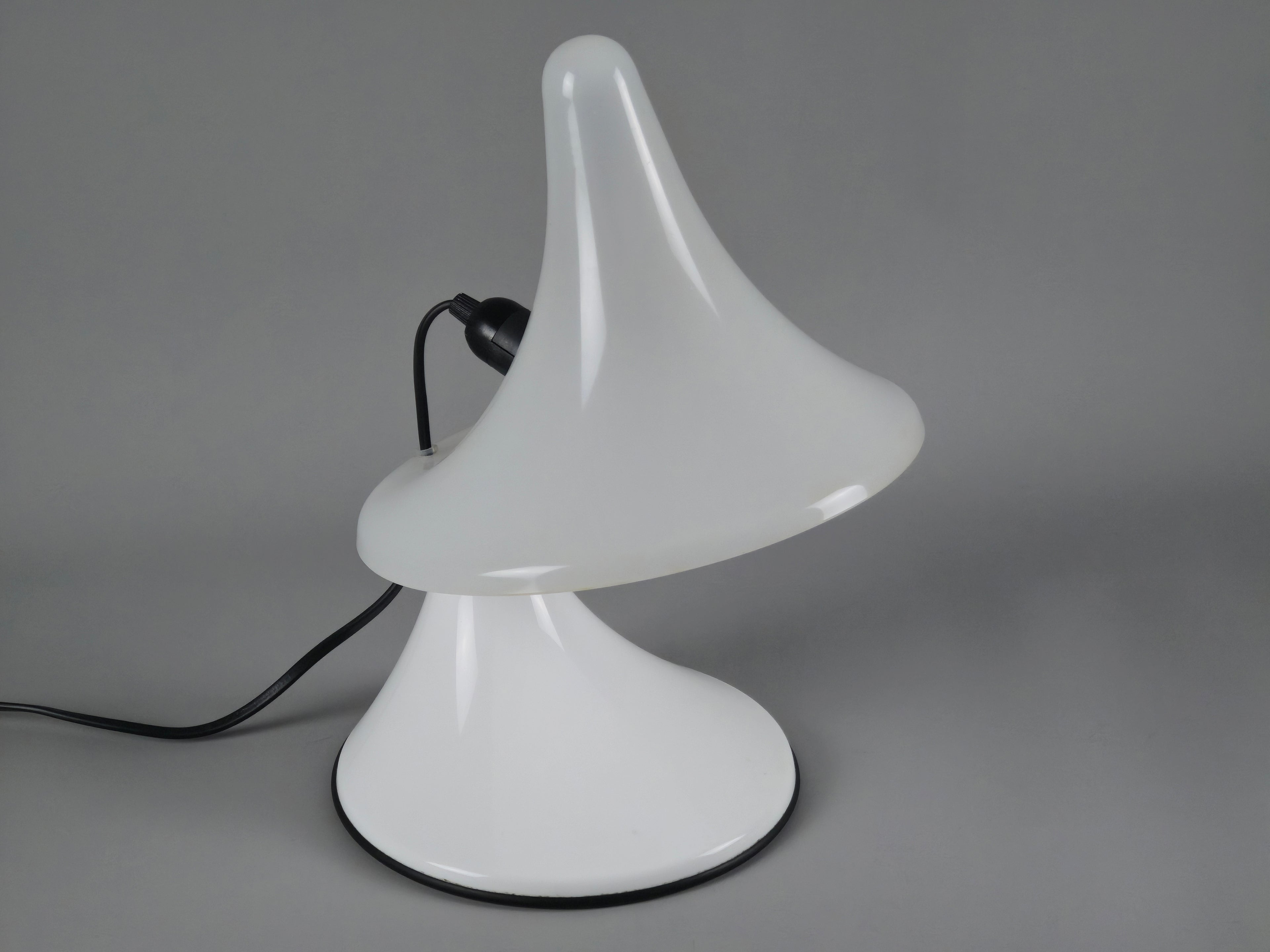 Three-quarter view of the Karin-M table lamp, showcasing the seamless transition from the base to the flared shade.