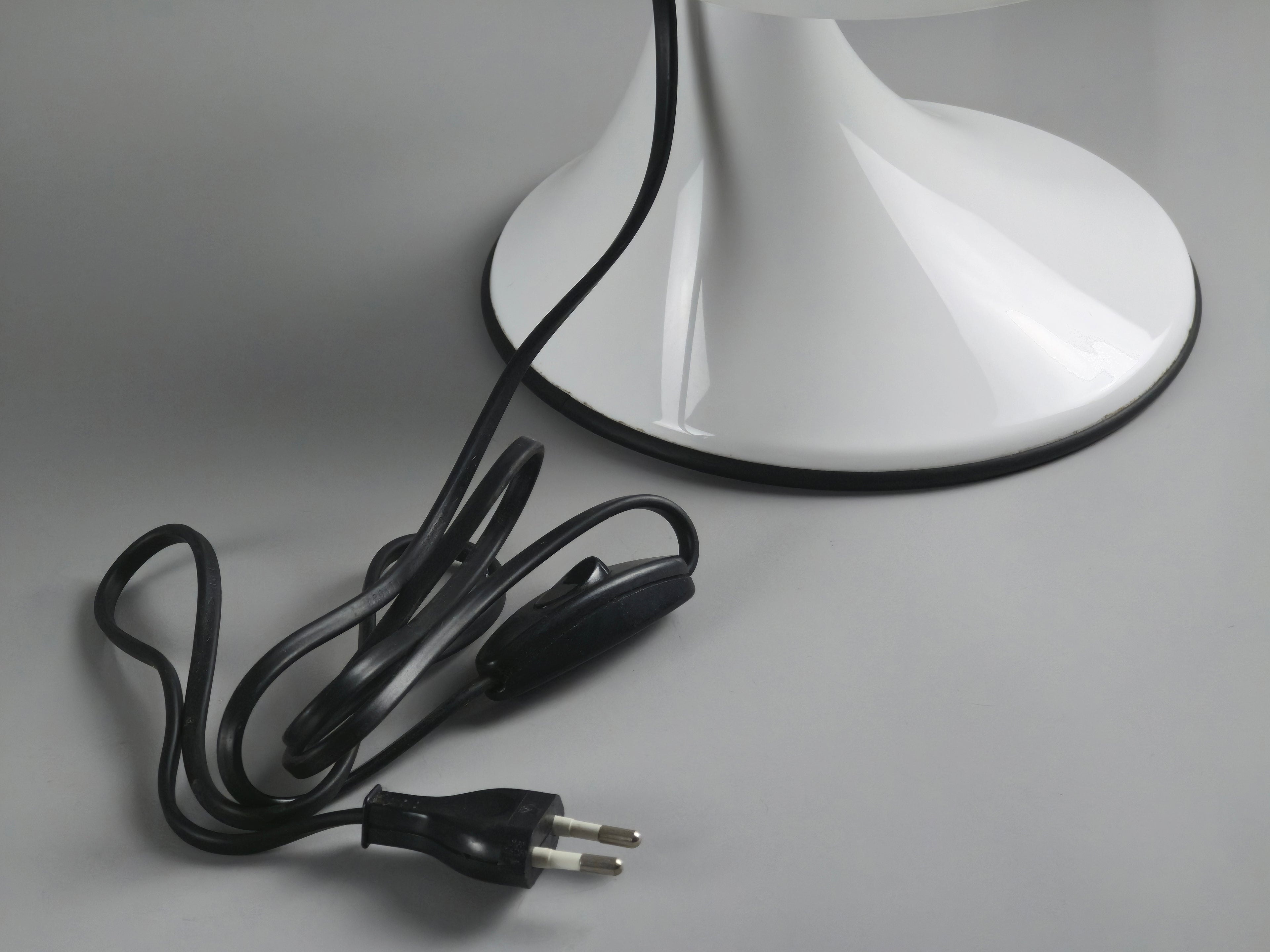 Detail of the original black electrical cord and plug, emphasizing the authentic vintage components of the Art Plex lamp.
