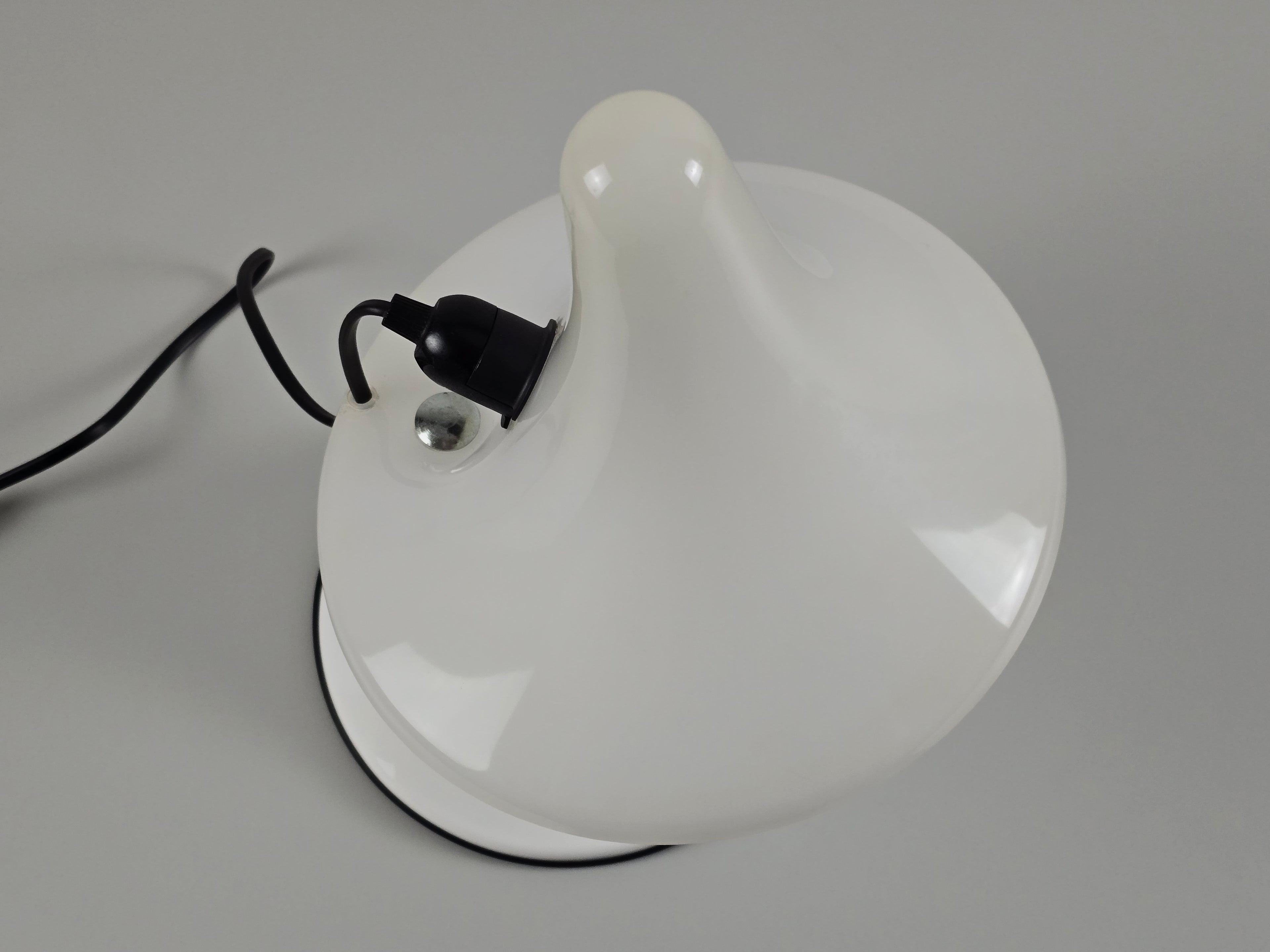Top-down view of the Karin-M lamp, illustrating the wide-flared trumpet shape and minimalist white finish.