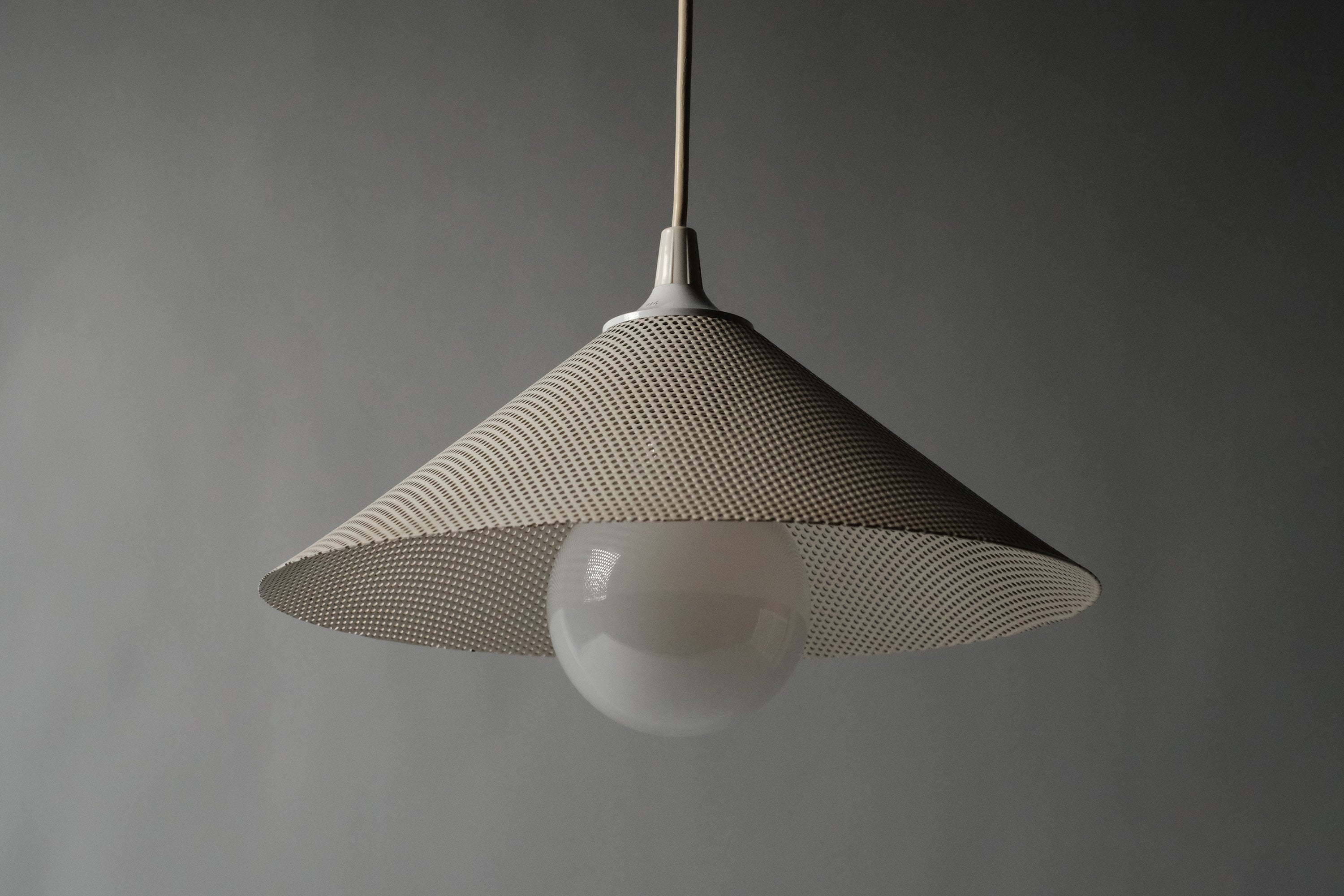Low angle view of Herda industrial pendant lamp, conical shade profile