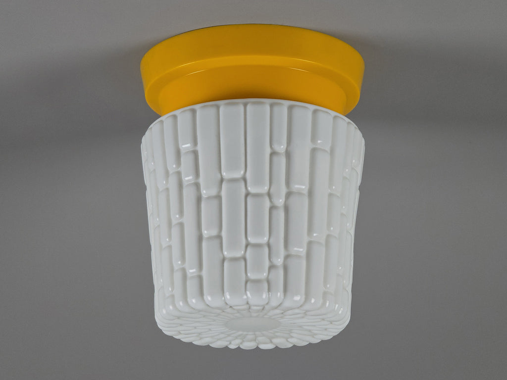 vintage ceiling light with yellow plastic base