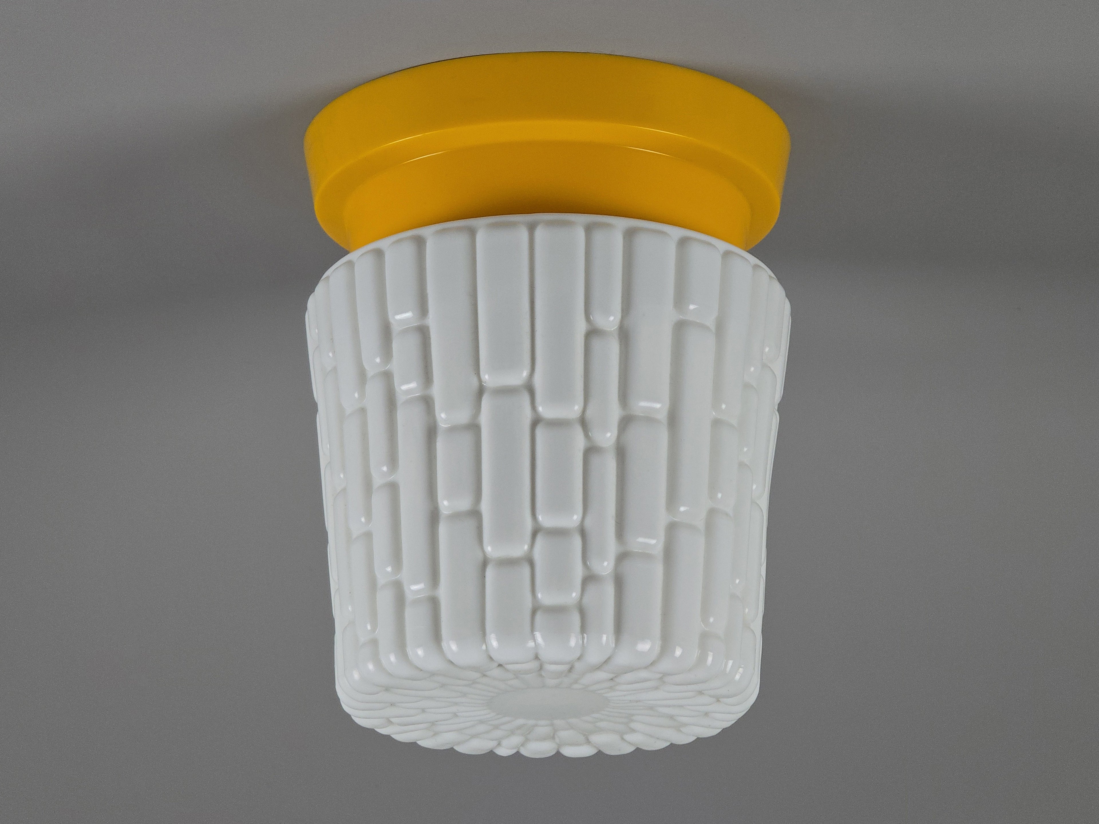 vintage ceiling light with yellow plastic base