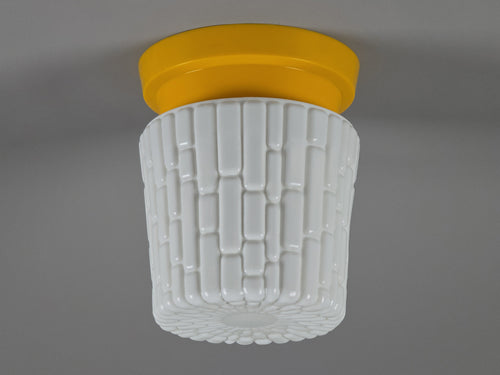 vintage ceiling light with yellow plastic base